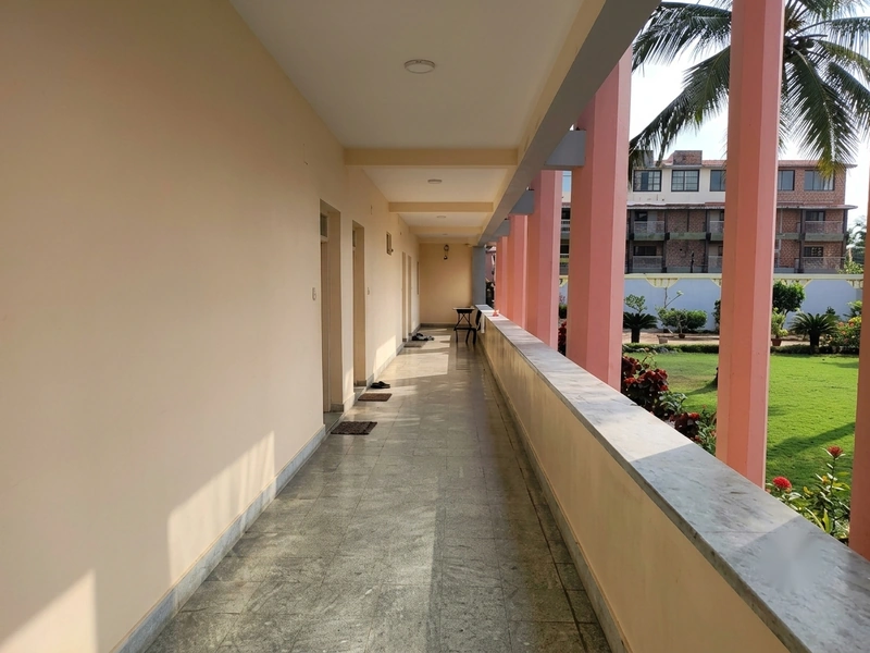 Beach-facing balcony view from Birla Guest House Puri first floor