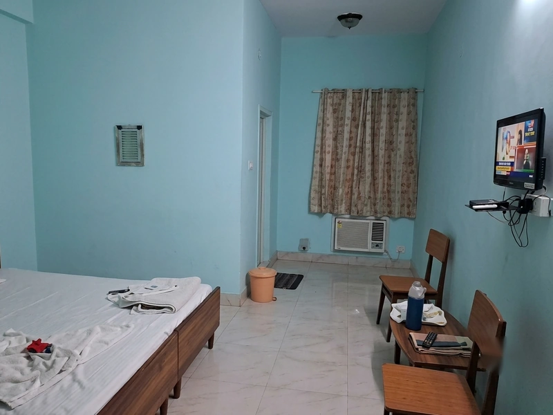 Interior view of ground floor AC room at Birla Guest House Puri